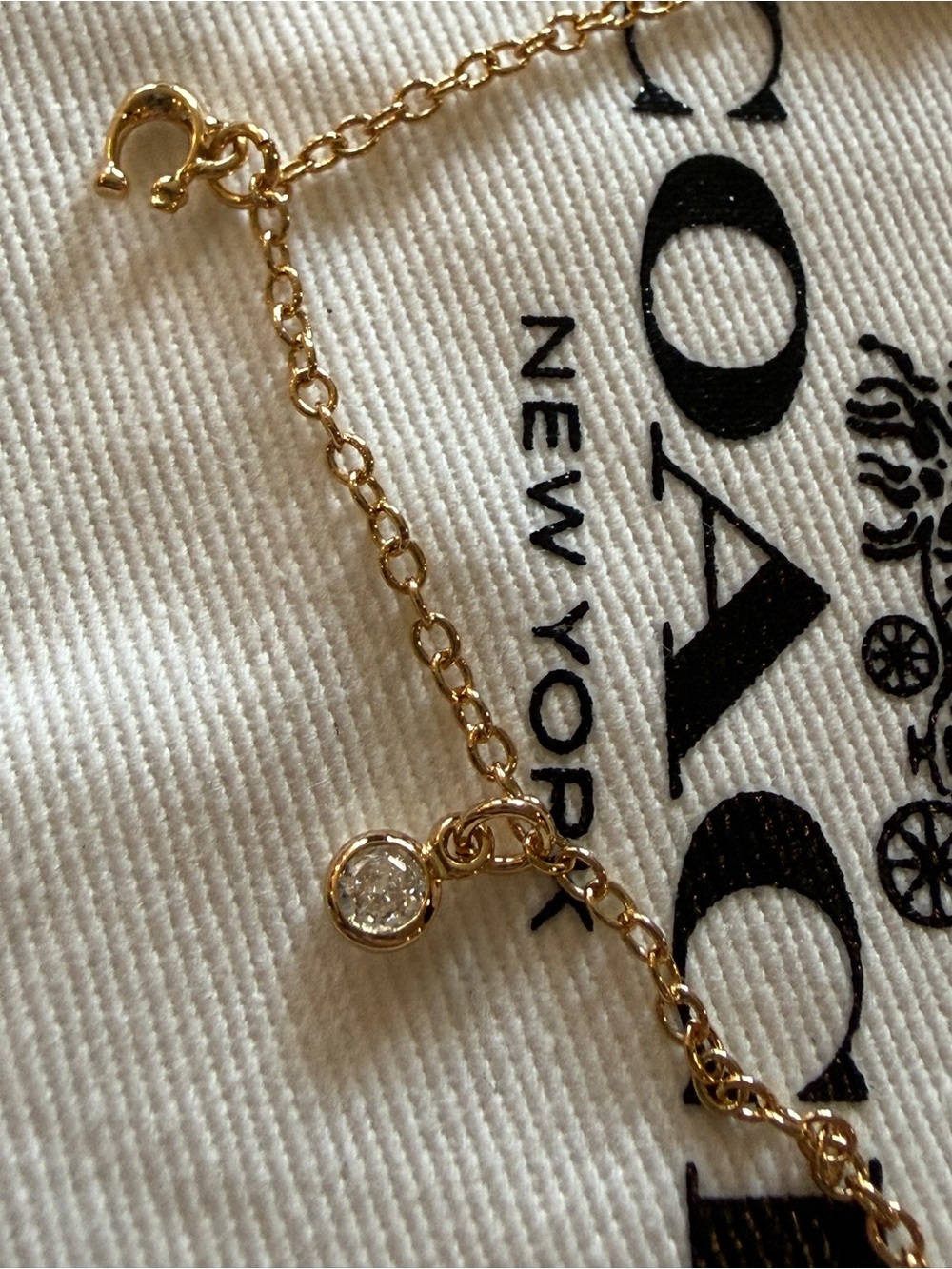 Coach Gold-Tone Charm Bracelet with Chain Detail - Picture 4 of 9